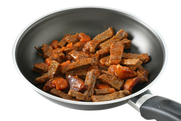 fried beef with sausages and carrot