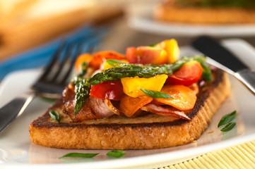 Baked asparagus, mango, tomato, carrot, bacon sandwich