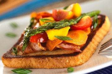 Baked asparagus, mango, tomato, carrot, bacon sandwich