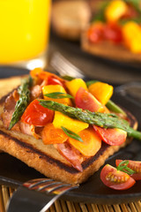 Baked asparagus, mango, tomato, carrot, bacon sandwich