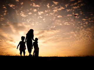 Kite flying at sunset