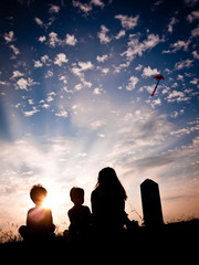 Kite flying at sunset