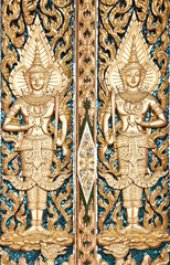 Thai textured gate at Wat Sirisaotong, Thailand