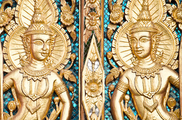 Thai textured gate at Wat Sirisaotong, Thailand