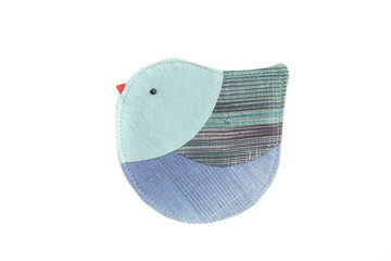 cute bird sew by cloth isolated on a white background