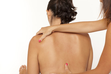 Naklejka premium Massage of back on white background
