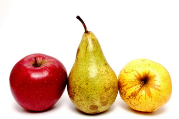 Juicy apples and pears closeup on white background
