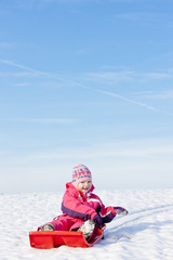 little girl with bob in snow