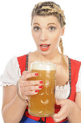 Blonde junge Frau im Dirndl mit Bierglas