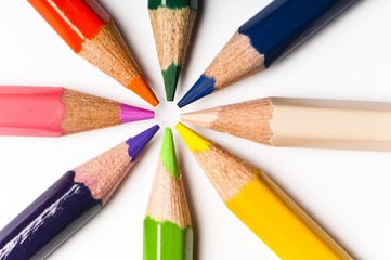 close up detail of star arranged multicolored pencils