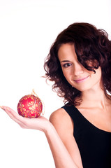 Beautiful smiling girl with Christmas ball