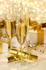 Glass of champagne against sparkle background