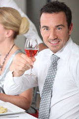 portrait of a man toasting