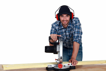 Man using a mitre saw