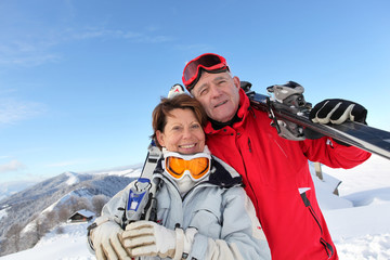 Portrait of mature couple in ski holidays