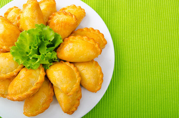 Patties stuffed with meat in the plate