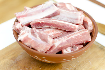 raw pork ribs on a plate