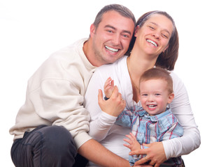 Fototapeta na wymiar Happy young family isolated on white background