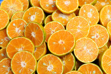 Fresh orange fruits slices background