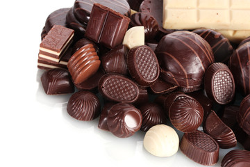 Many different chocolate candy isolated on white