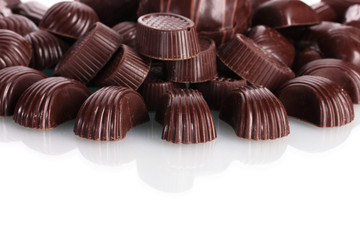 Many different chocolate candy isolated on white
