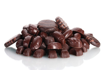 Many different chocolate candy isolated on white