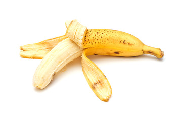 Half-peeled banana on white background