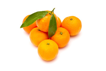 Ripe tangerines on white background