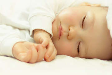 close-up portrait of adorable sleeping baby
