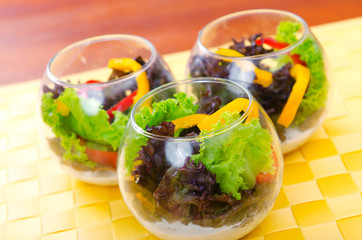 Fresh healthy salad in bowls