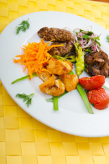 Plate with tasty lamp kebabs