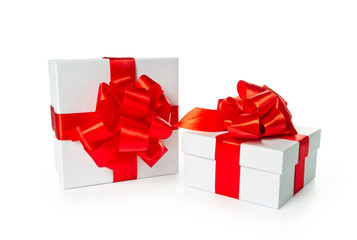 Two white pasteboard square gift boxes