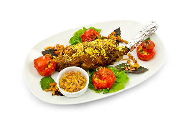 Lamb leg served in the plate