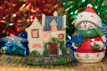 christmas house and snowman