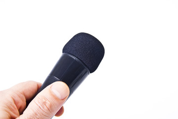 mano con micrófono