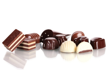 Many different chocolate candy isolated on white