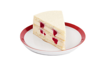 Piece of cream cheese cake with rasbberry