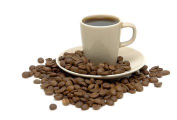 cup of coffee and coffee beans on white background