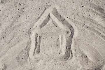 Childlike Drawing Of House In Sand