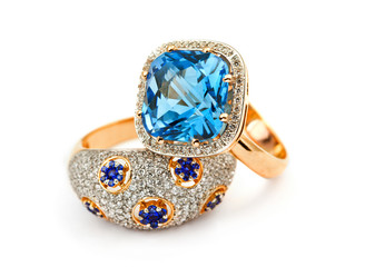 Elegant jewelry ring with sapphire and blue topaz - obrazy, fototapety, plakaty