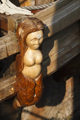 Details of a wooden female figure