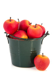 Green bucket red apples