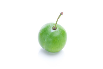 green plum isolated on white