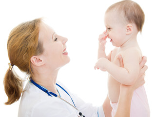 Doctor holding a baby in her arms on a white background.
