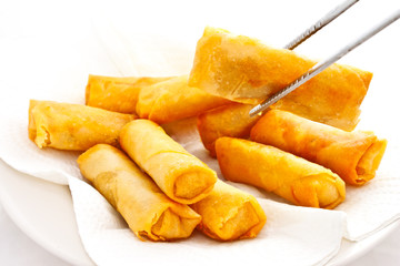 fried springrolls, taken by chopsticks