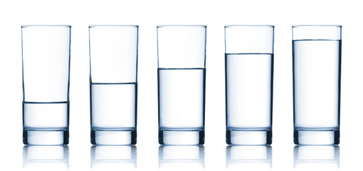 set of glasses filled with water
