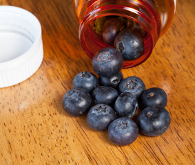 Blueberries in drug bottle