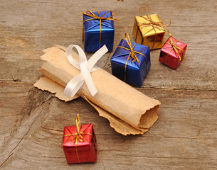 colorful gift boxes with an old scroll