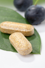 Bilberry pills and berries