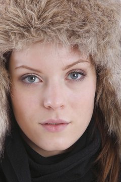 young beautiful woman with a winter cap (open eyes)